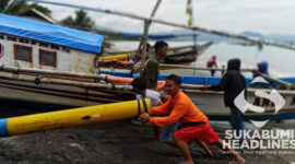 Tim Gabungan mengevakusi perahu nelayan Cisolok yang hilang di Perairan Banten. l Istimewa
