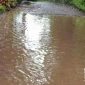 Jalan digenangi air di ruas Bojonggenteng - Kalapanunggal. l Istimewa