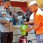 Pengoplos elpiji 3 kg ke 12 kg ditangkap polisi. l Istimewa