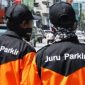 Ilustrasi juru parkir. - Istimewa