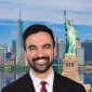 Zohran Mamdani dengan latar belakang patung Liberty dan Kota New York - Ist