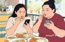 Ilustrasi mindless eating, makan sambil memainkan handphone mengakibatkan berat badan naik - sukabumiheadline.com