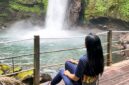 Titi Kamal duduk sambil memandang Curug Sawer, Situ Gunung - @titi_kamall