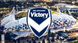 Logo Melbourne Victory FC dengan latar Melbourne Rectangular Stadium - Ist